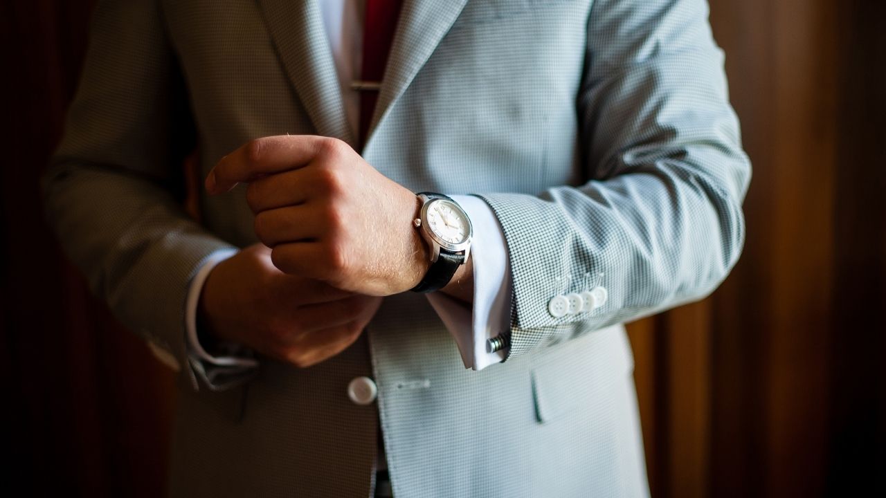 A guy wearing a dress watch