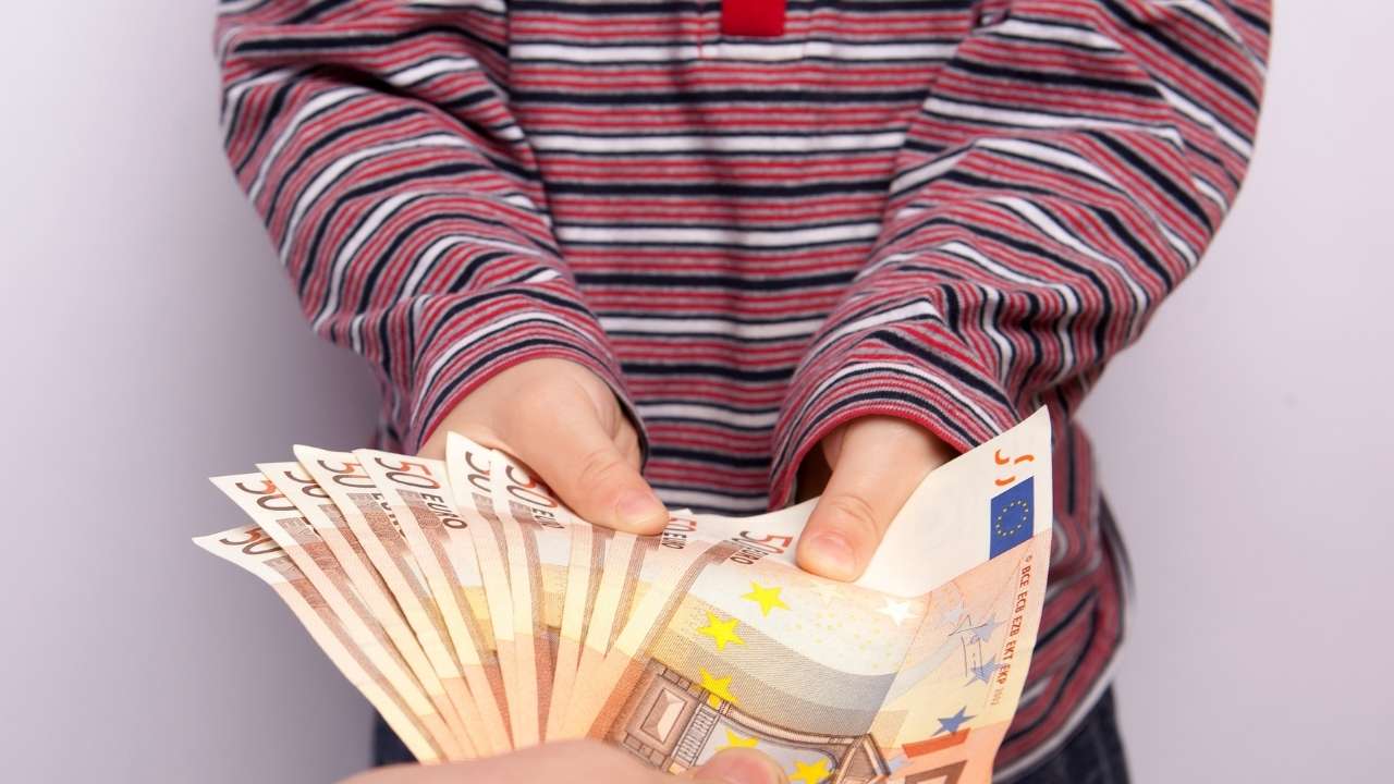 A child taking money