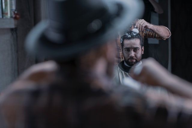 man having hair spa in salon