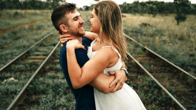 Boy and girl hugging and looking at each other