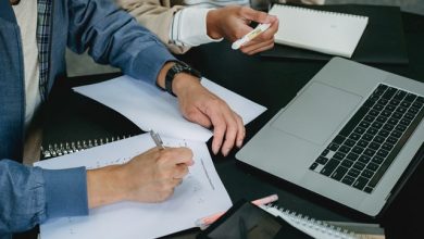 Two guys taking classes from online tutor