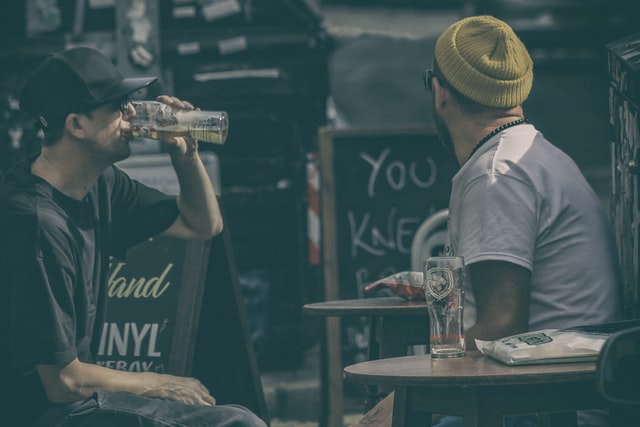 Two men drinking