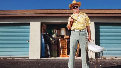 a man standing in front of Storage Solutions