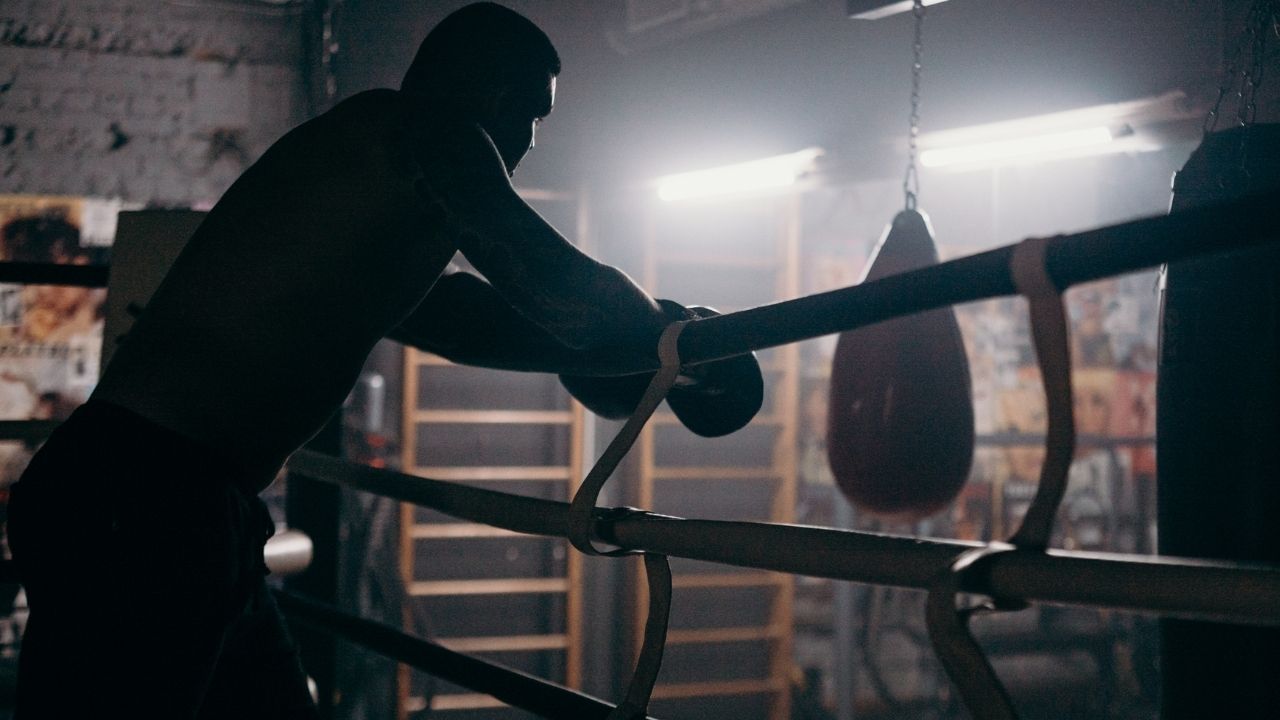 Boxer standing near boxing ring