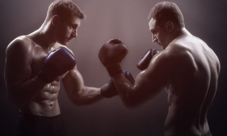 two boxers facing each other