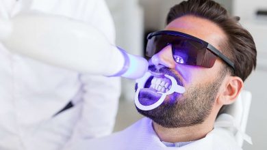 A man getting Teeth Whitening procedure