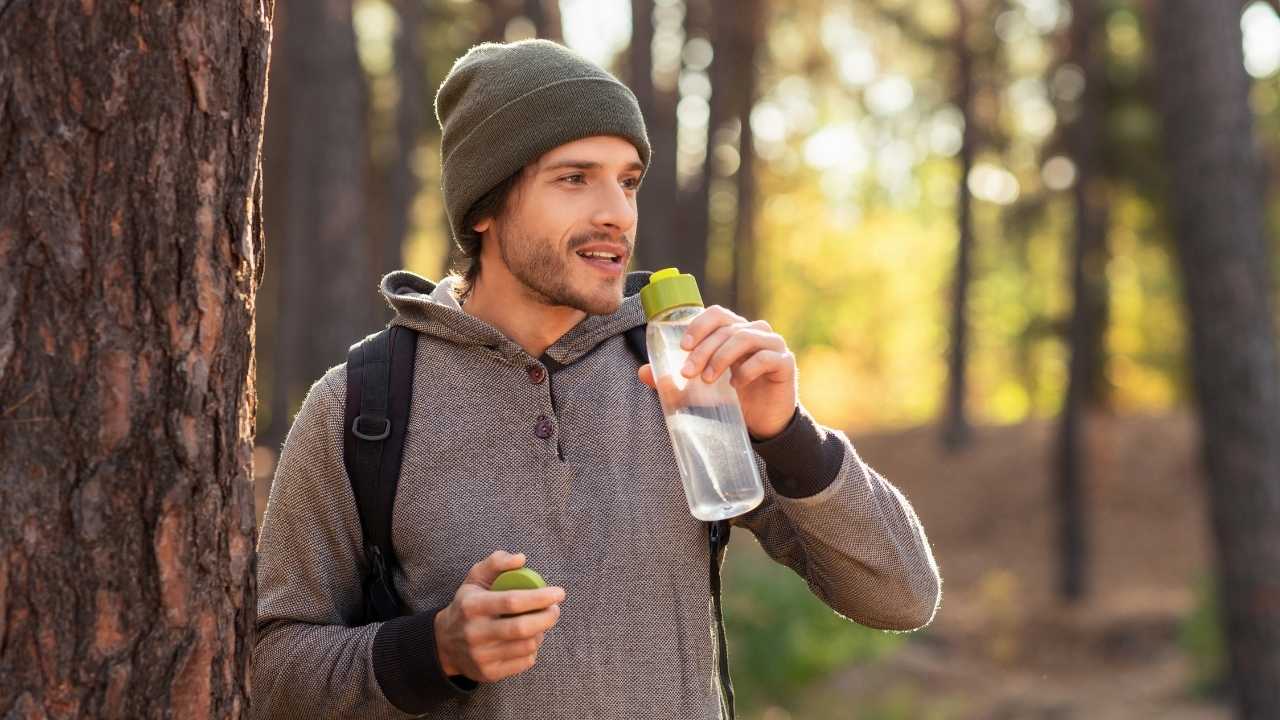 A guy drinking water