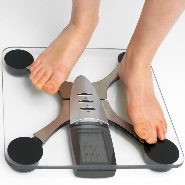 Feet on weight scale 