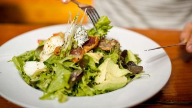 guy eating salad