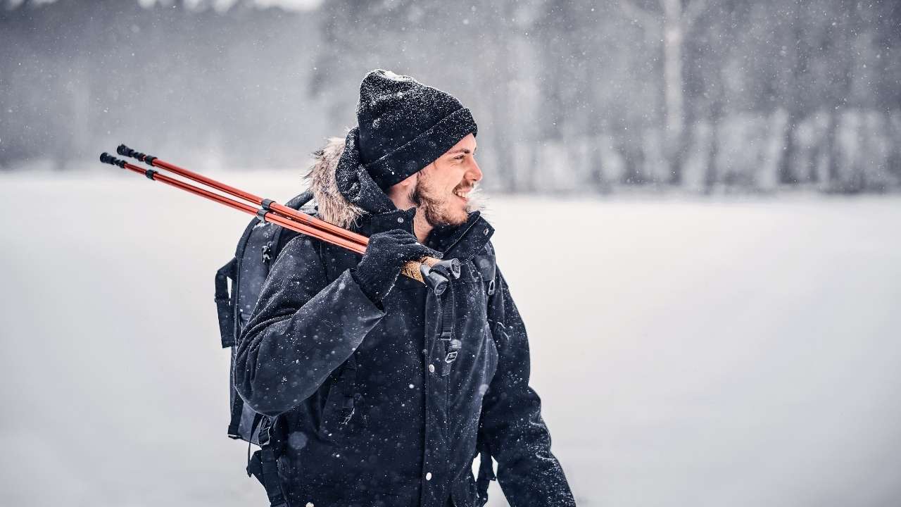 A guy in winter travelling solo