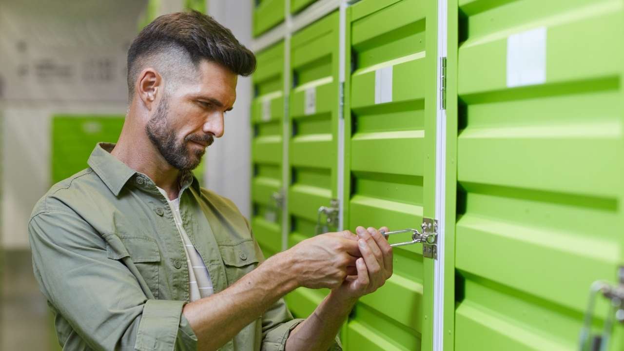 Man opening a storage unit