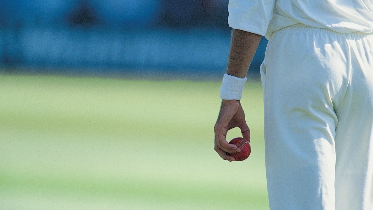 A cricket player bowling