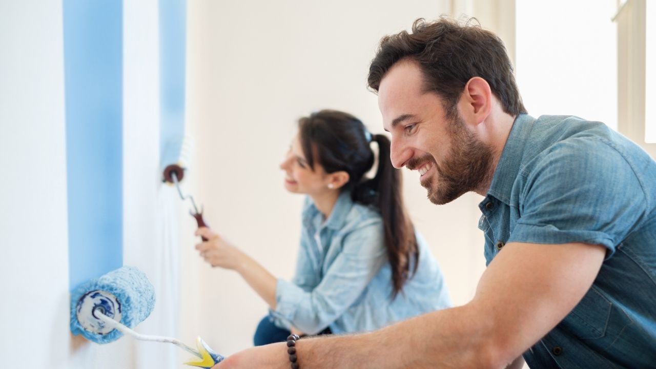 couple painting walls