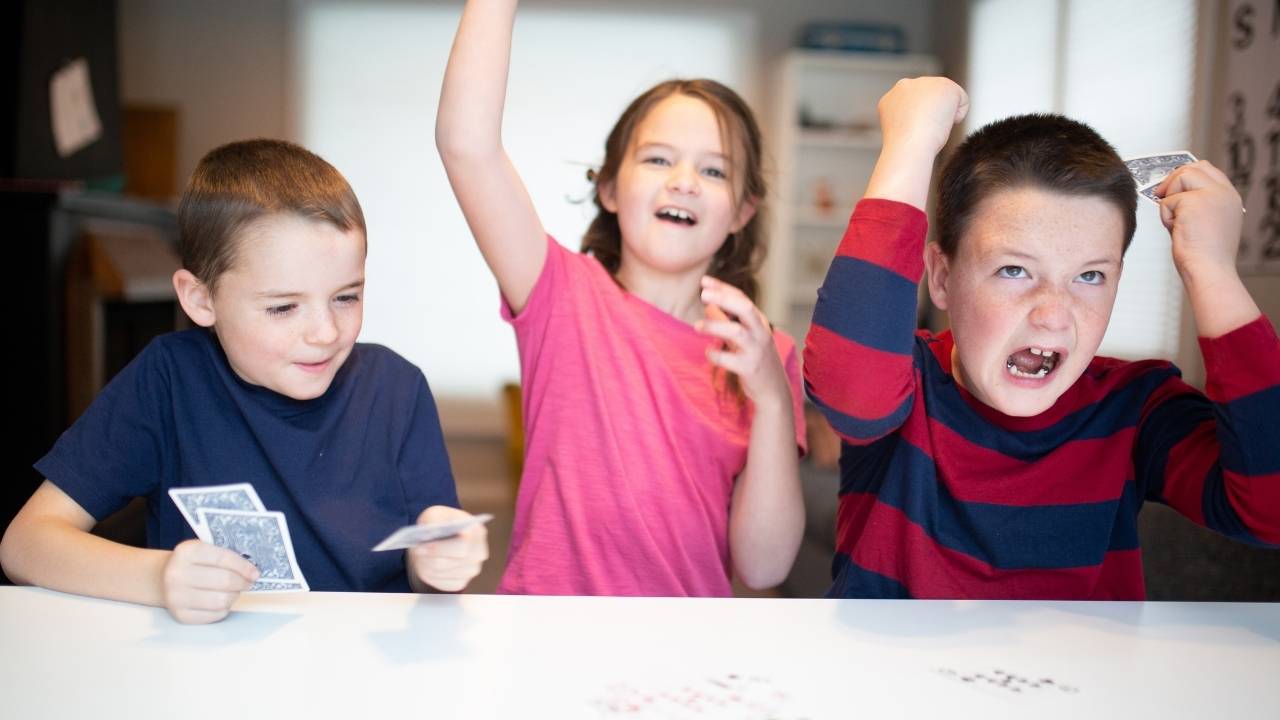 Kids playing card games