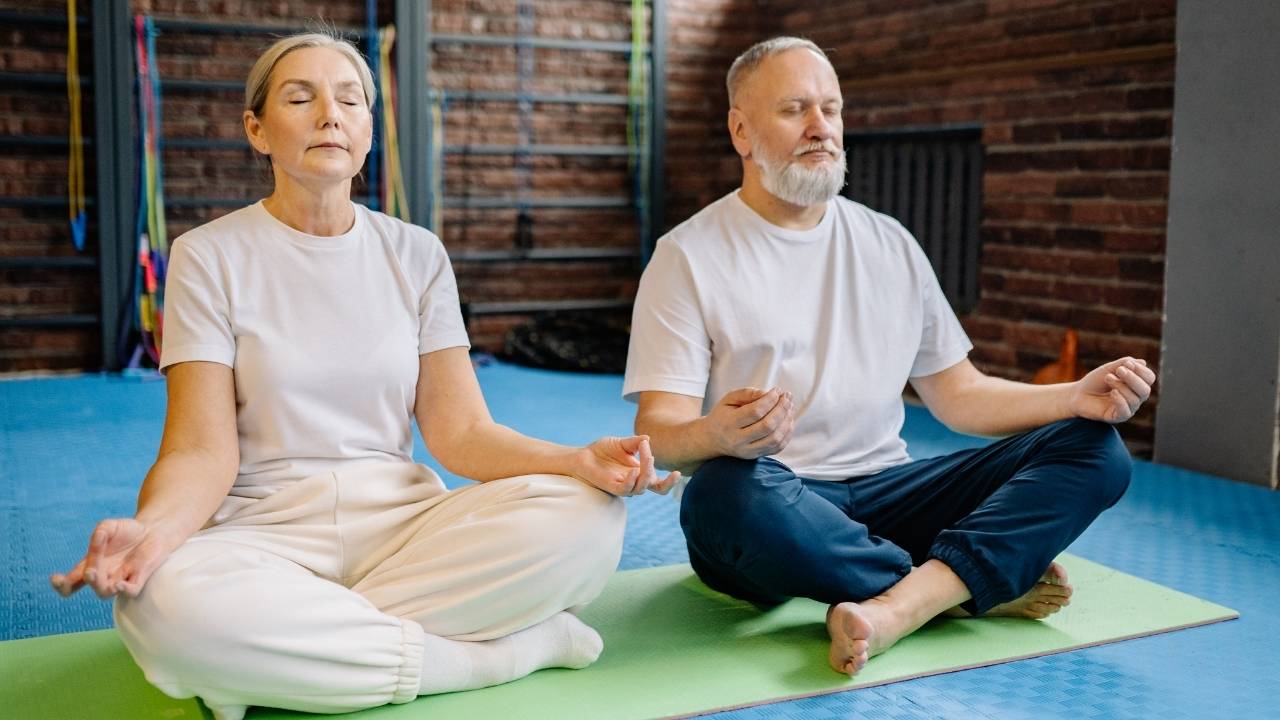 Seniors doing yoga