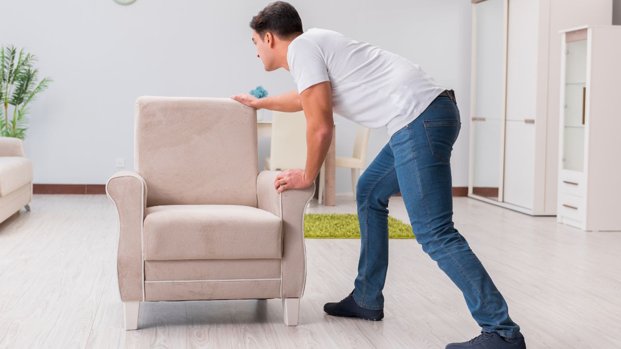 A guy moving furniture