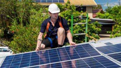 A guy working on solar panels