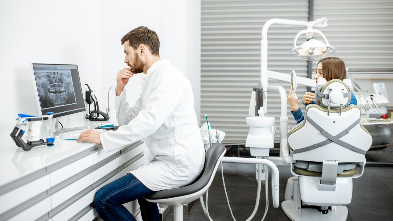 Dentist on computer