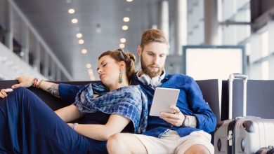 Couple waiting for their flight delay