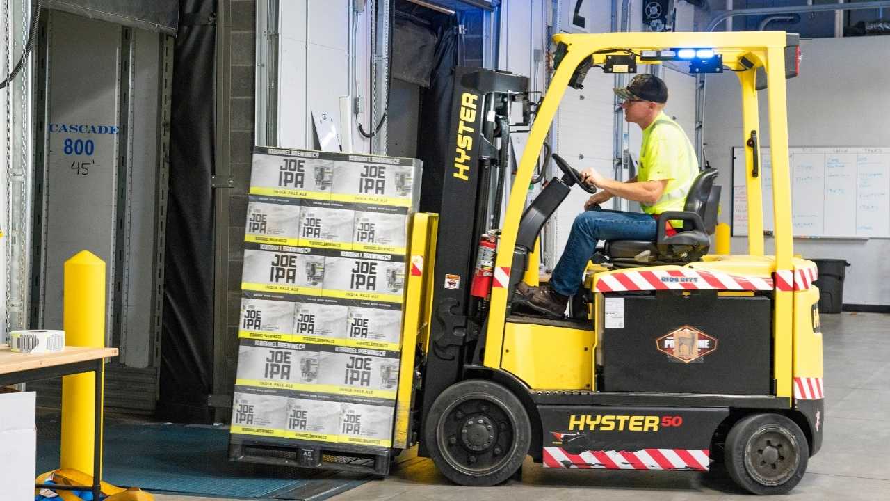 A guy using Forklift