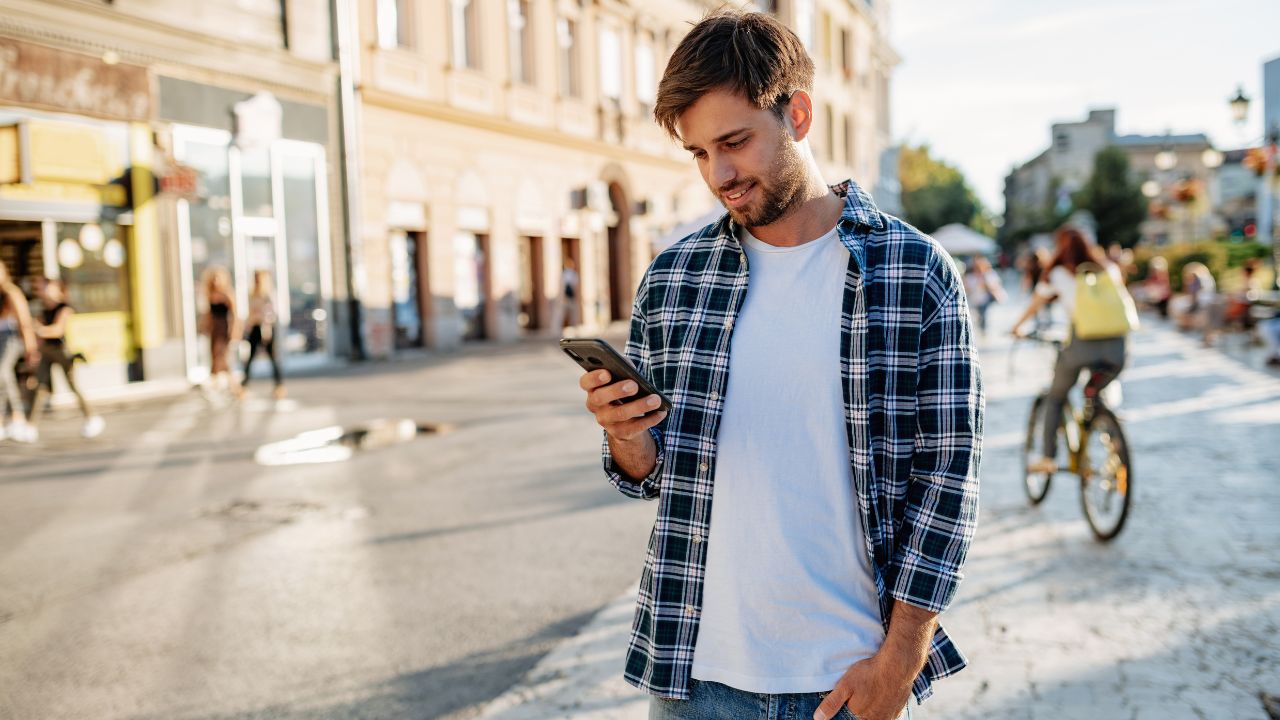 Guy using his phone