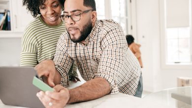 Couple using online Monthly Payment