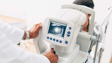 Eye Doctor checking eyesight of a patient