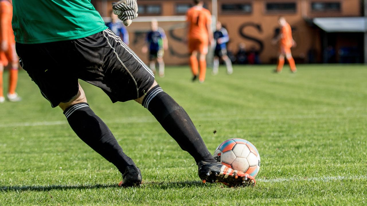 Guys playing football