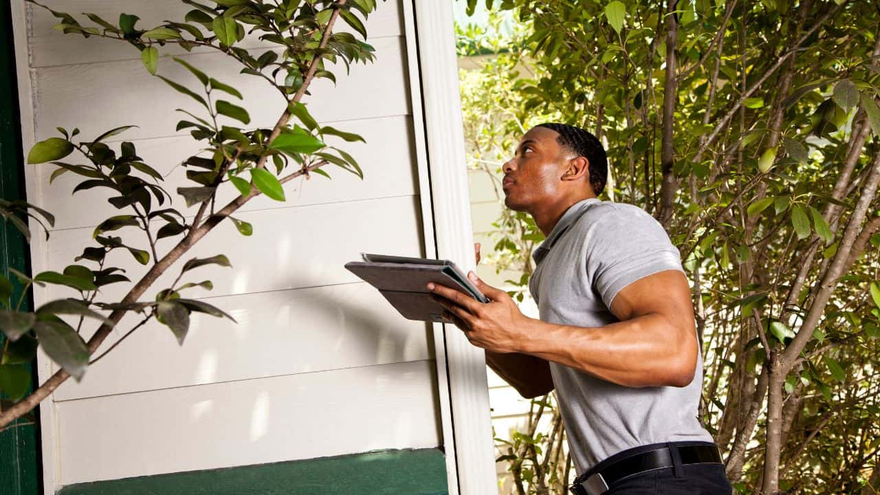 A guy doing Home Inspection