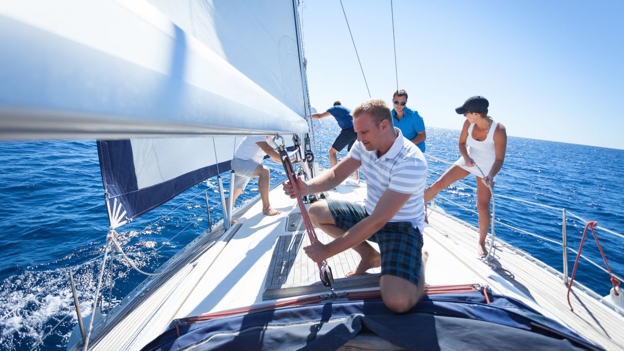 guys sailing on a boat