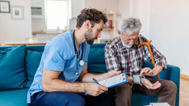 male nurse looking after a patient