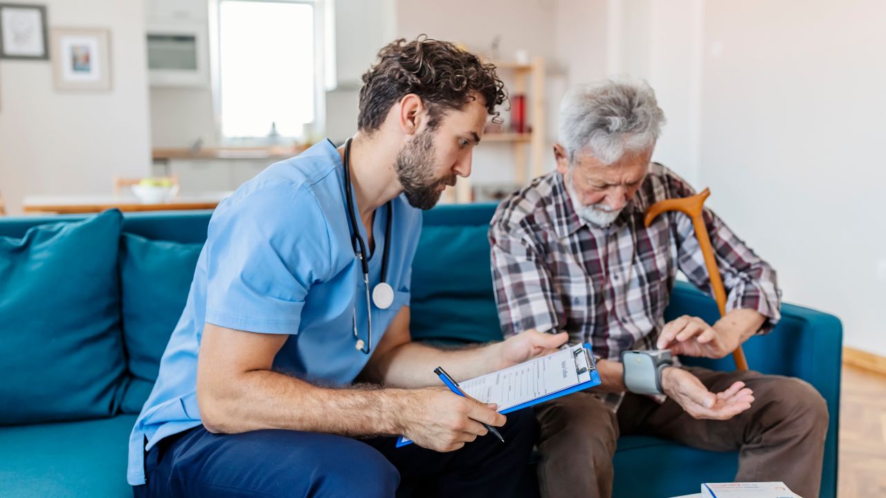 male nurse looking after a patient