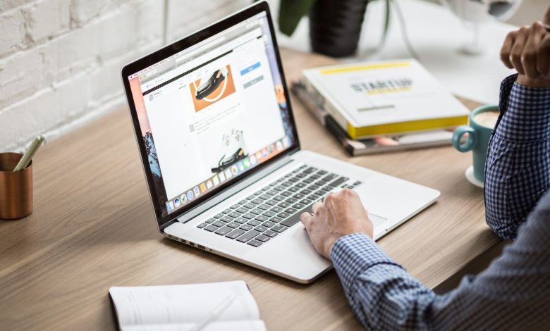 man using laptop for internet access