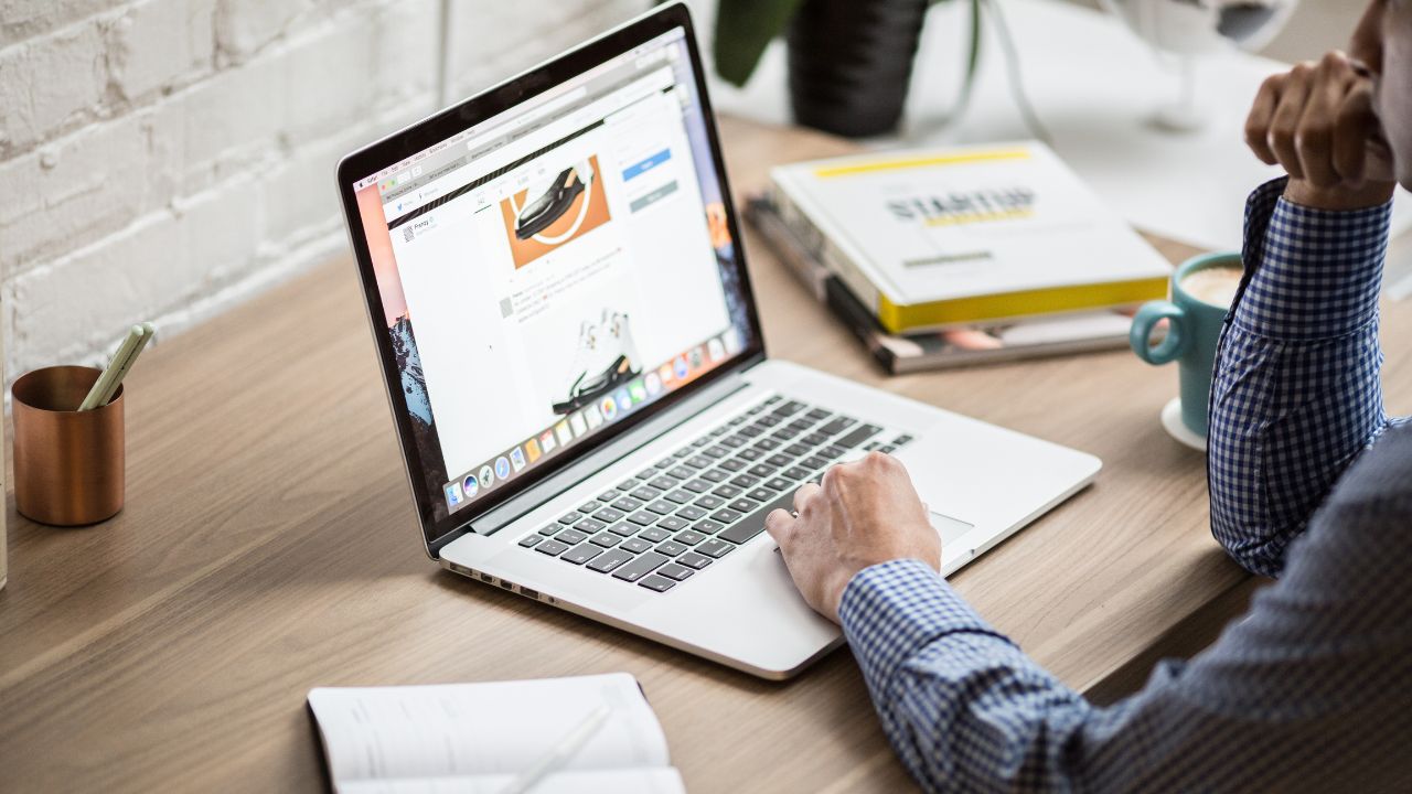 man using laptop for internet access