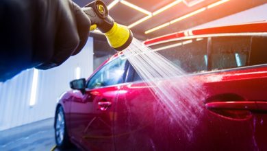 Car service technician working on a vehicle to keep it in top shape for resale