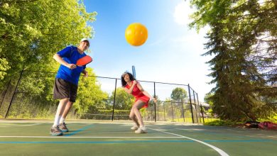 guy and girl playing Pickleball