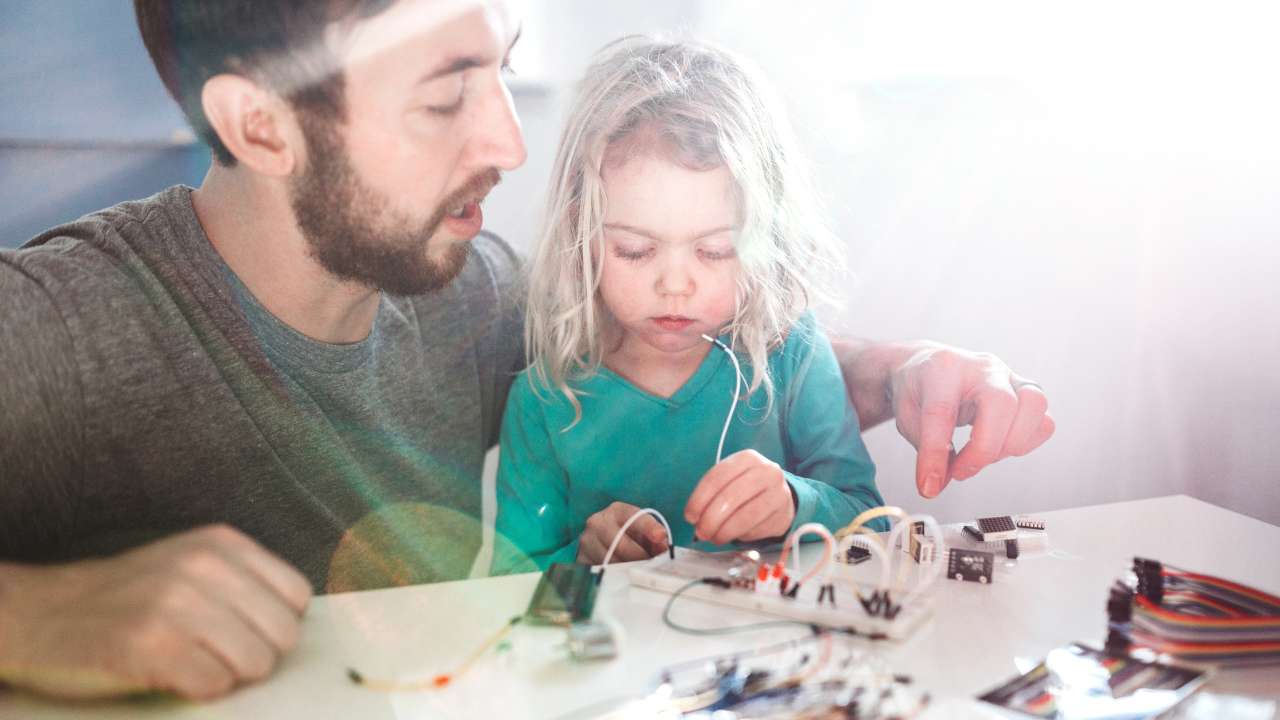 dad teaching child