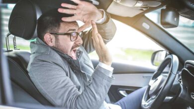 guy sitting in a car scared before a crash