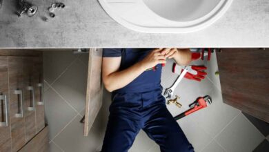 Plumbing Experts working in a home