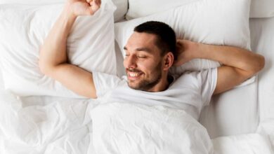 happy guy in bed