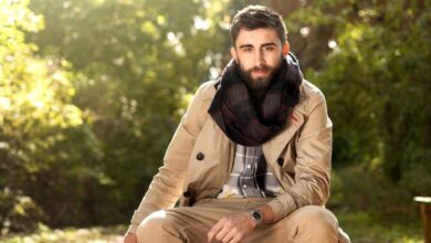 a man sitting outside during autumn