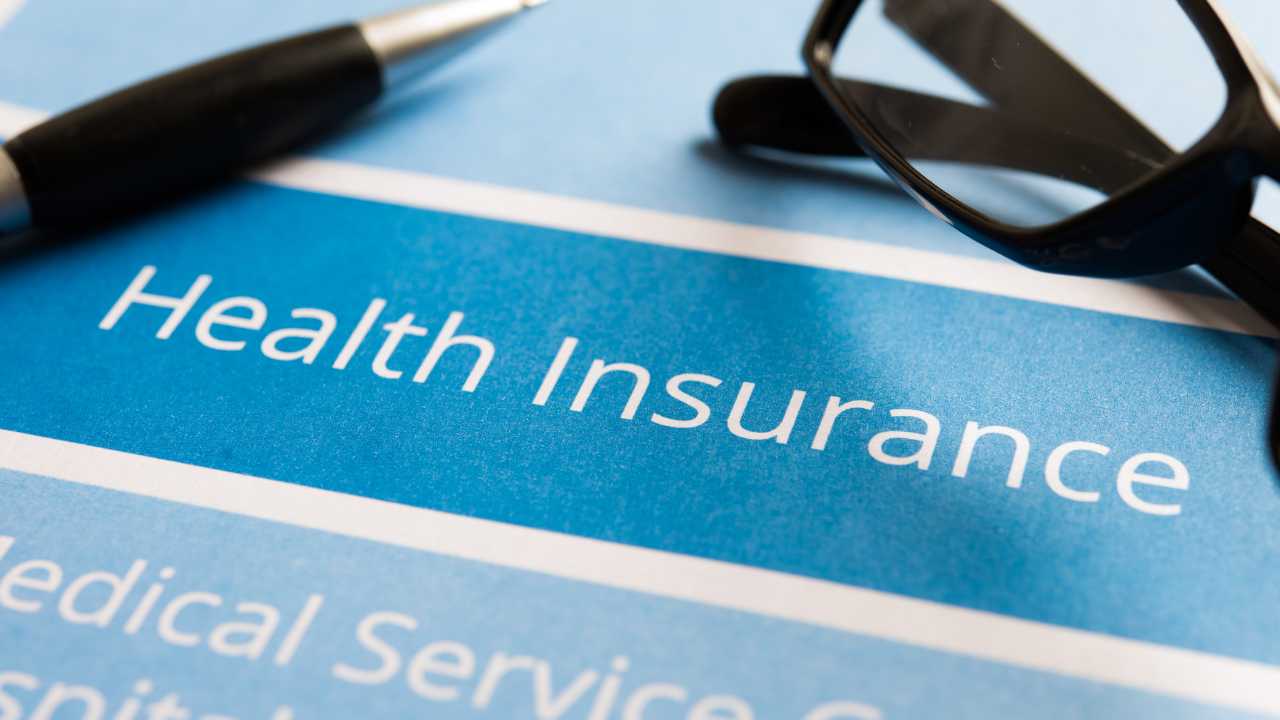 Health Insurance written on a paper